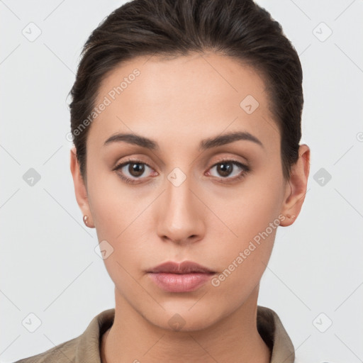 Neutral white young-adult female with short  brown hair and brown eyes