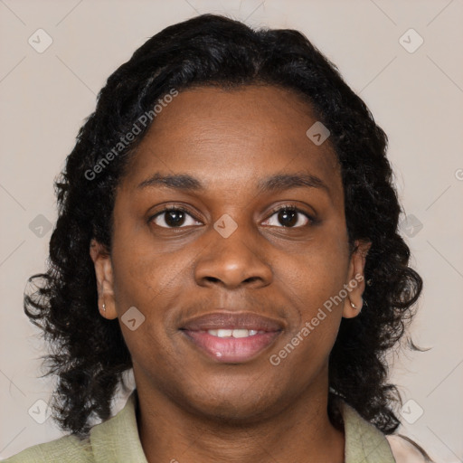 Joyful black young-adult female with medium  black hair and brown eyes