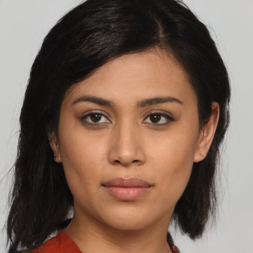 Joyful asian young-adult female with medium  black hair and brown eyes