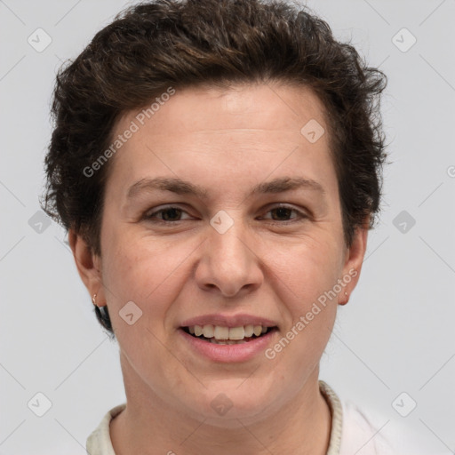 Joyful white adult female with short  brown hair and grey eyes