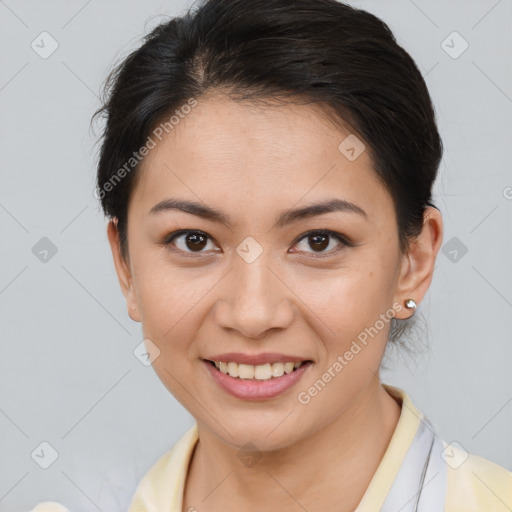 Joyful asian young-adult female with short  brown hair and brown eyes