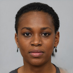 Neutral black young-adult female with short  black hair and brown eyes