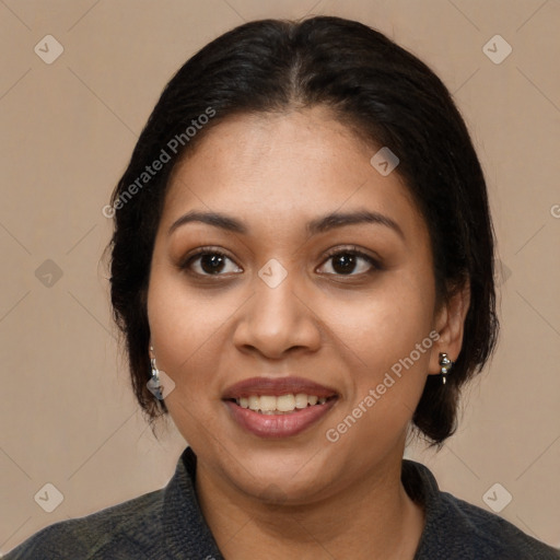 Joyful latino young-adult female with medium  brown hair and brown eyes