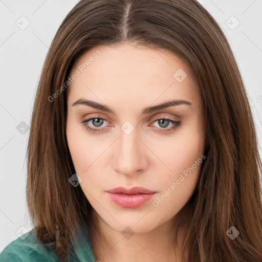 Neutral white young-adult female with long  brown hair and brown eyes