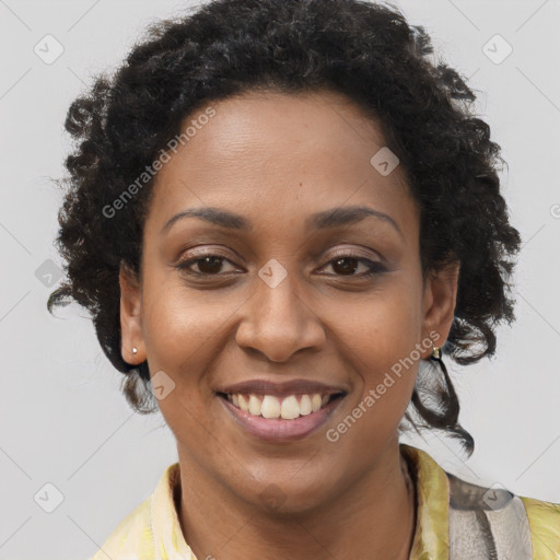 Joyful black young-adult female with medium  brown hair and brown eyes