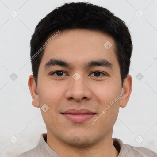 Joyful asian young-adult male with short  brown hair and brown eyes