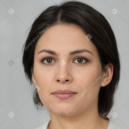 Neutral white young-adult female with medium  brown hair and brown eyes