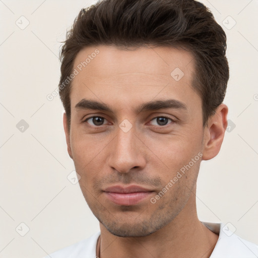 Neutral white young-adult male with short  brown hair and brown eyes