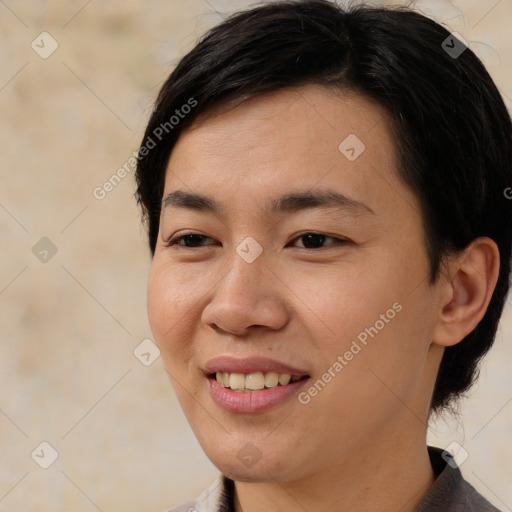 Joyful asian young-adult female with short  brown hair and brown eyes