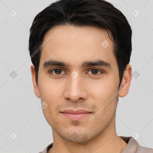 Joyful white young-adult male with short  brown hair and brown eyes