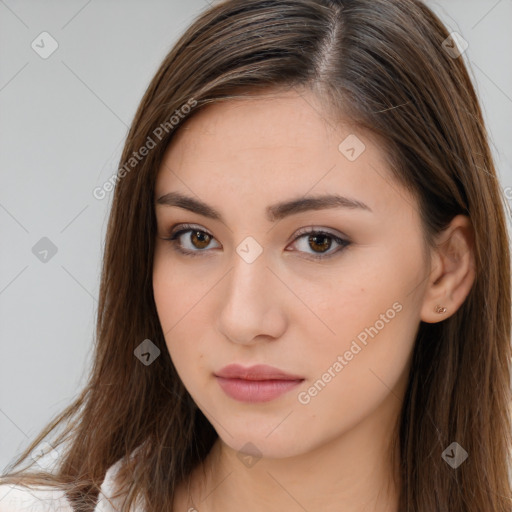 Neutral white young-adult female with long  brown hair and brown eyes