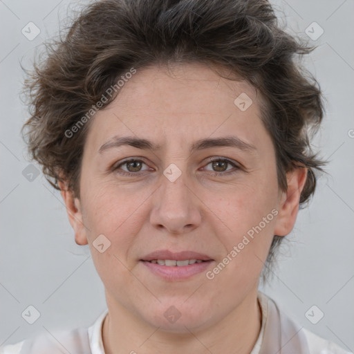 Joyful white adult female with short  brown hair and brown eyes