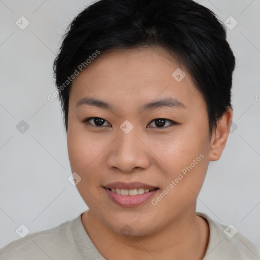 Joyful asian young-adult female with short  brown hair and brown eyes