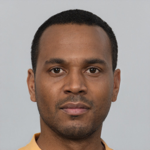Neutral latino young-adult male with short  brown hair and brown eyes