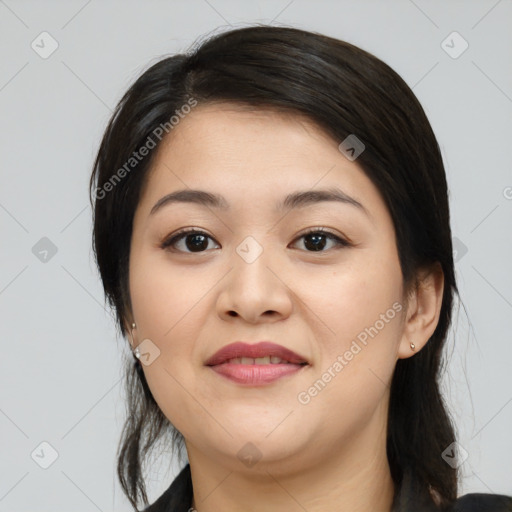 Joyful asian young-adult female with medium  black hair and brown eyes