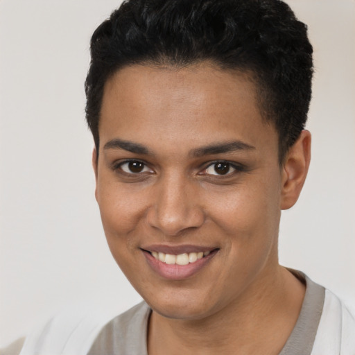 Joyful latino young-adult female with short  brown hair and brown eyes