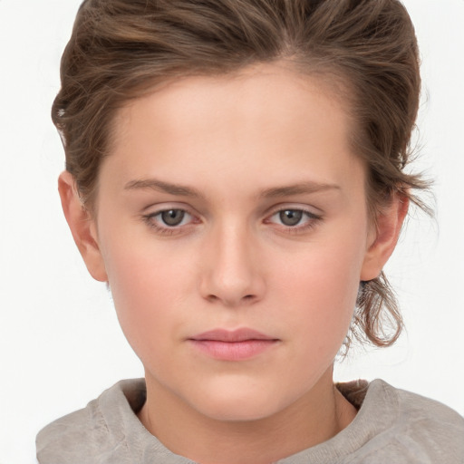 Neutral white child female with short  brown hair and grey eyes