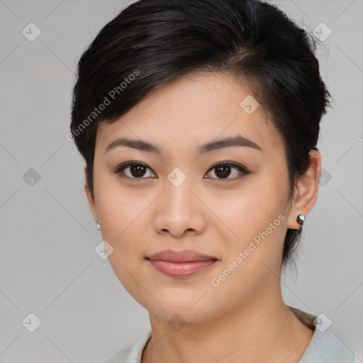 Joyful asian young-adult female with medium  black hair and brown eyes