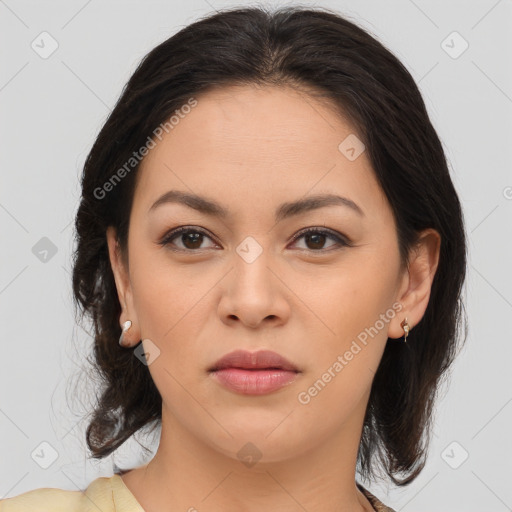 Joyful asian young-adult female with medium  brown hair and brown eyes