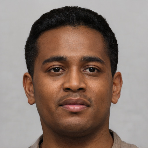 Neutral black young-adult male with short  black hair and brown eyes