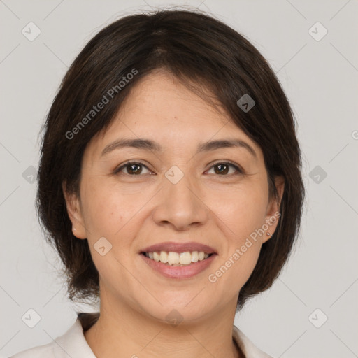 Joyful white adult female with medium  brown hair and brown eyes