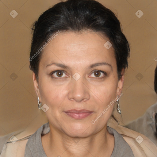 Joyful white adult female with short  brown hair and brown eyes