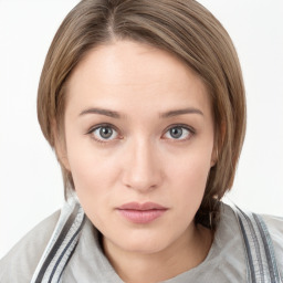 Neutral white young-adult female with medium  brown hair and grey eyes