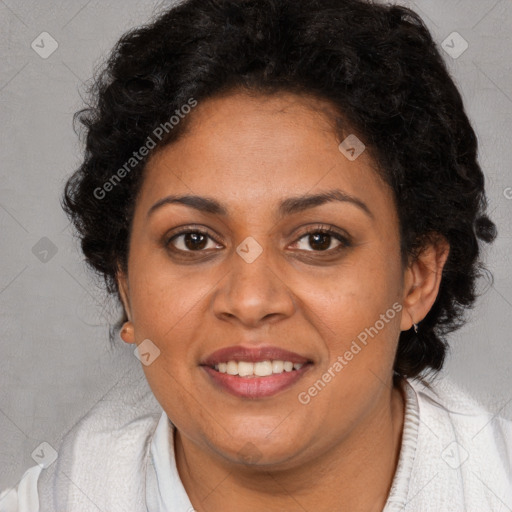 Joyful white adult female with long  brown hair and brown eyes