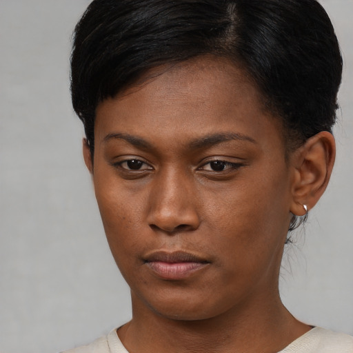 Neutral asian young-adult female with short  brown hair and brown eyes