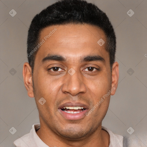 Joyful black young-adult male with short  black hair and brown eyes