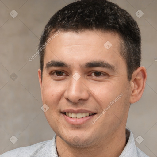 Joyful white young-adult male with short  brown hair and brown eyes