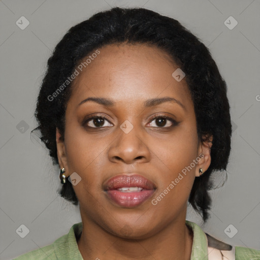 Joyful black young-adult female with medium  brown hair and brown eyes