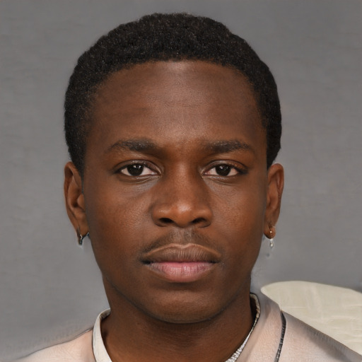 Neutral black young-adult male with short  brown hair and brown eyes