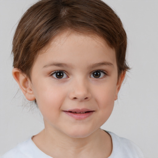 Joyful white child female with short  brown hair and brown eyes