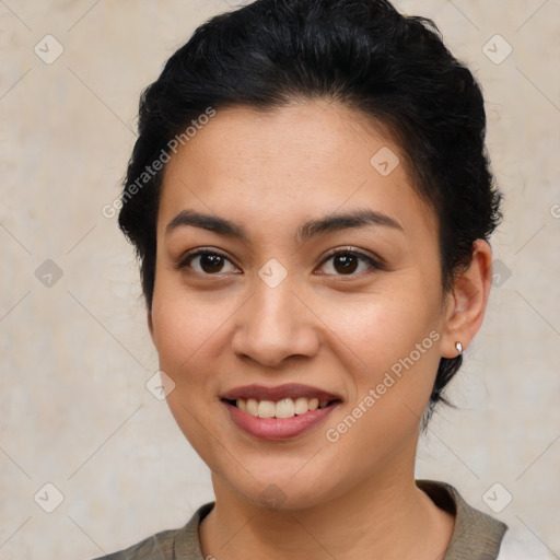 Joyful latino young-adult female with short  brown hair and brown eyes