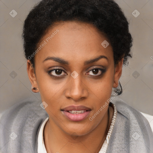 Joyful black young-adult female with short  brown hair and brown eyes