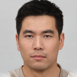 Neutral asian young-adult male with short  black hair and brown eyes