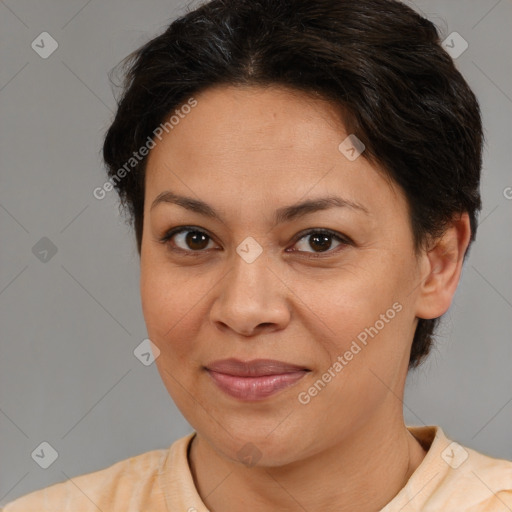 Joyful white adult female with medium  brown hair and brown eyes