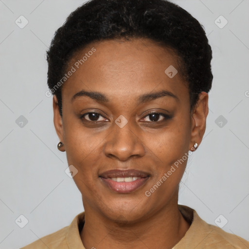 Joyful black young-adult female with short  black hair and brown eyes