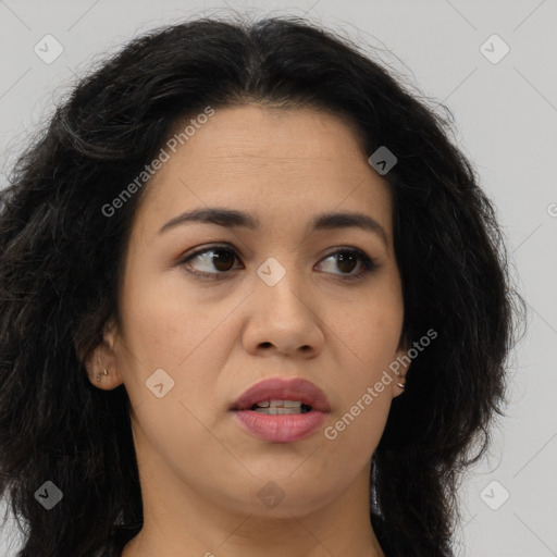 Joyful asian young-adult female with long  brown hair and brown eyes