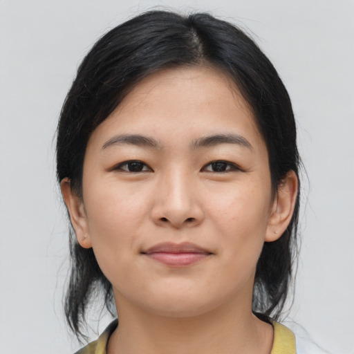 Neutral asian young-adult female with medium  brown hair and brown eyes