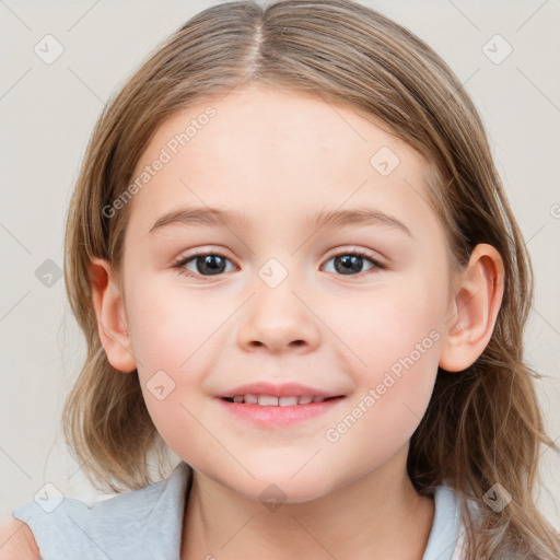 Joyful white child female with medium  brown hair and blue eyes