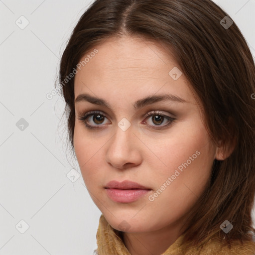 Neutral white young-adult female with long  brown hair and brown eyes