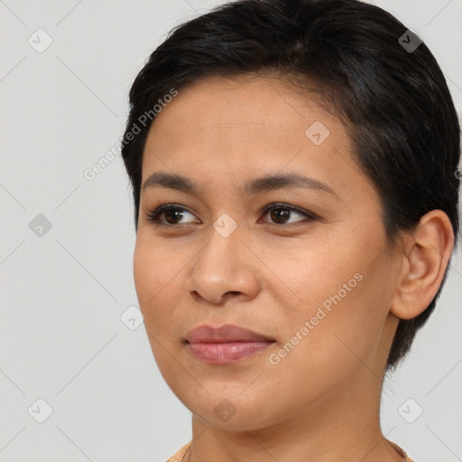 Joyful white young-adult female with short  brown hair and brown eyes