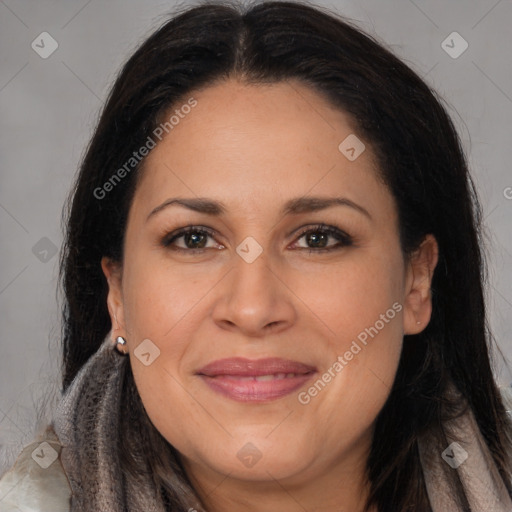 Joyful white adult female with long  brown hair and brown eyes