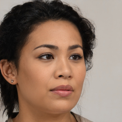 Neutral latino young-adult female with medium  brown hair and brown eyes
