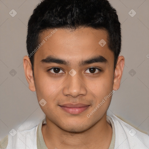 Joyful latino young-adult male with short  black hair and brown eyes