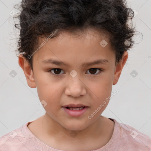 Joyful white child male with short  brown hair and brown eyes