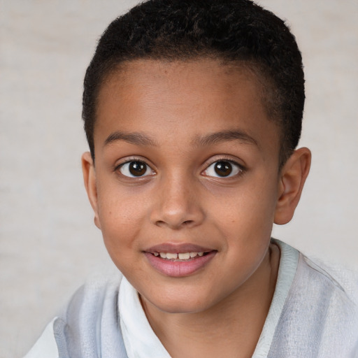 Joyful white child female with short  brown hair and brown eyes