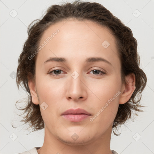 Neutral white young-adult female with medium  brown hair and brown eyes